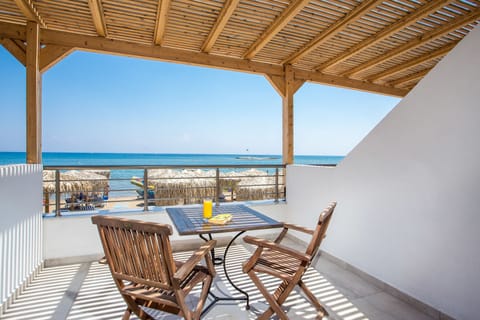 Room, Beachfront | In-room safe, soundproofing, iron/ironing board, free WiFi