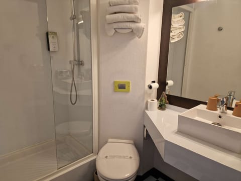 Shower, hydromassage showerhead, eco-friendly toiletries, hair dryer