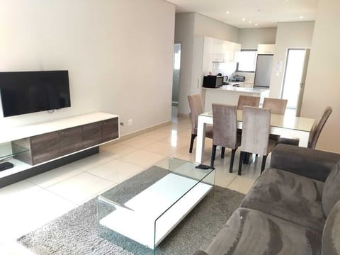 Apartment, 2 Bedrooms | Living area | 50-inch Smart TV with satellite channels, TV, heated floors