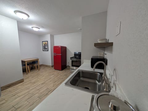 Suite, 1 King Bed with Sofa bed, Non Smoking (Oven, Dishwasher) | Private kitchen | Coffee/tea maker, freezer