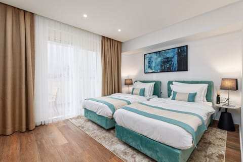 Deluxe Double or Twin Room | In-room safe, desk, blackout drapes, iron/ironing board