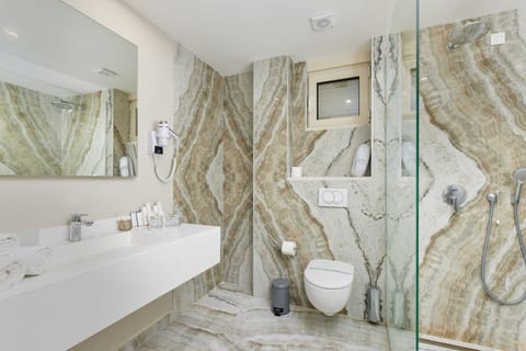 Free toiletries, hair dryer, slippers, towels