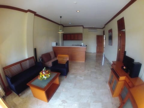 Junior Suite, Sea View | Living area | TV, DVD player, first-run movies