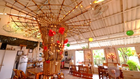 Breakfast, lunch, dinner served; international cuisine, garden views