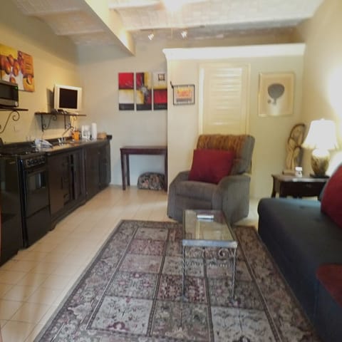 Studio Suite | Private kitchen | Shared fridge, microwave