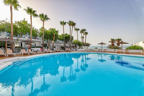 2 outdoor pools, pool umbrellas, sun loungers