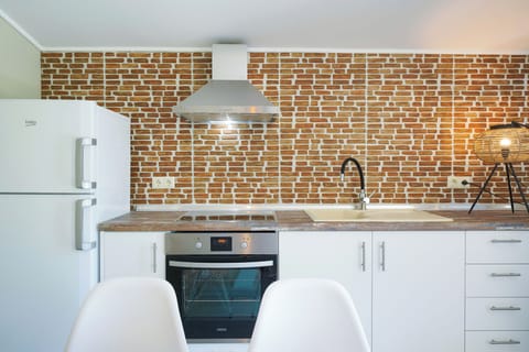 Deluxe Loft, 2 Bedrooms | Private kitchen | Fridge, microwave, stovetop, espresso maker