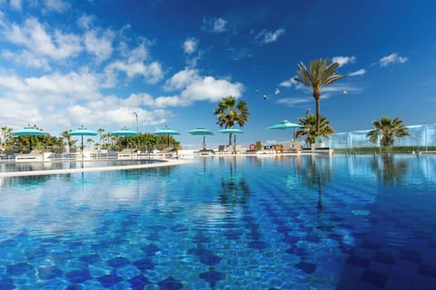 Indoor pool, 3 outdoor pools, pool umbrellas, sun loungers