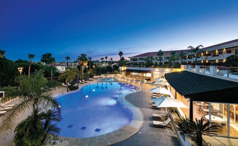 Indoor pool, 2 outdoor pools, open 9:00 AM to 6:00 PM, pool umbrellas