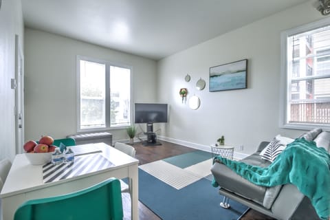 Premium Condo, 2 Bedrooms | Living room | 54-inch flat-screen TV with cable channels, TV, Netflix