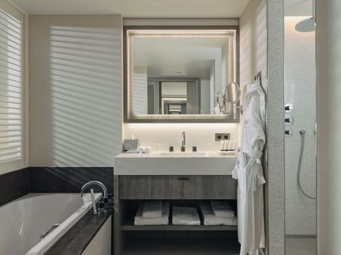 Standard Room, 1 King Bed, City View | Bathroom | Separate tub and shower, free toiletries, hair dryer, bathrobes