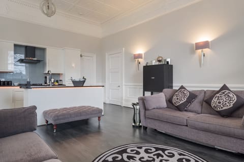 "Platinum" Luxury Apartment Double Bed with Double Walk-in Shower | Living area | 55-inch flat-screen TV with satellite channels, Smart TV, Netflix