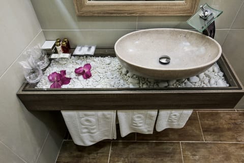 Quadruple Room | Bathroom | Shower, free toiletries, hair dryer, bathrobes