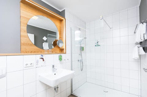 Shower, free toiletries, hair dryer, towels