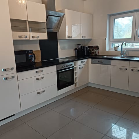 Exclusive Suite, Multiple Beds | Private kitchen | Fridge, coffee/tea maker, electric kettle