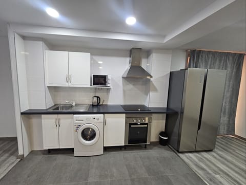 Apartment | Private kitchen | Fridge, microwave, oven, stovetop