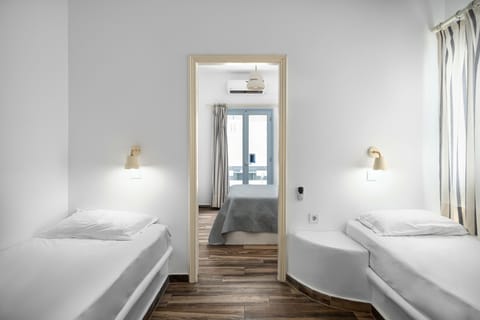 Two Bedroom Family Room with Street View | In-room safe, desk, iron/ironing board, free WiFi