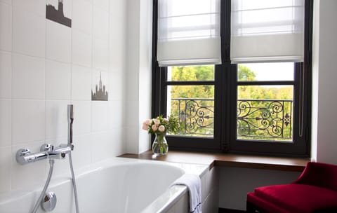 Eco-friendly toiletries, hair dryer, bathrobes, slippers