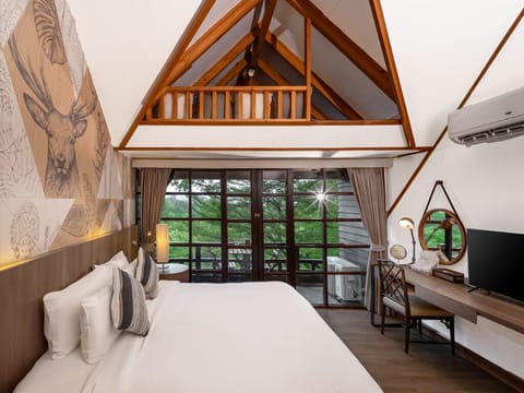 Tree House Junior Suite | Minibar, blackout drapes, iron/ironing board, free WiFi