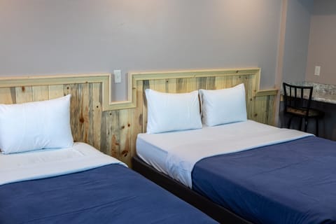 Room #4 | Desk, bed sheets