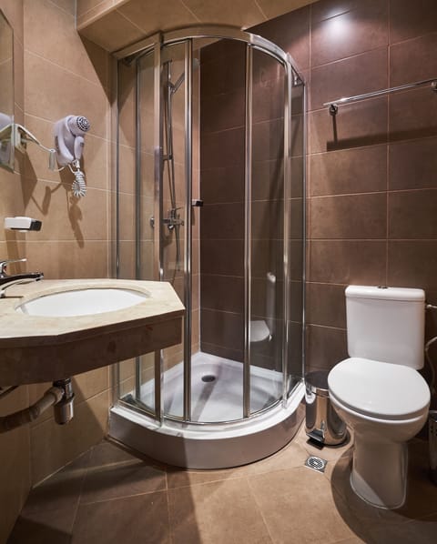 Apartment, 2 Bedrooms | Bathroom | Shower, free toiletries, hair dryer, slippers