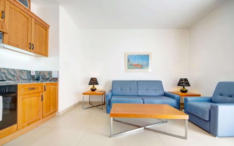 Standard Apartment, 1 Bedroom | Desk, laptop workspace, blackout drapes, iron/ironing board