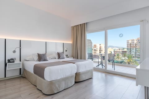 Superior Double Room, Balcony, Partial Sea View | Desk, WiFi (free), bed sheets