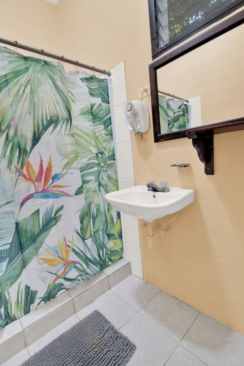 Family Room, Multiple Beds | Bathroom | Shower, free toiletries, towels