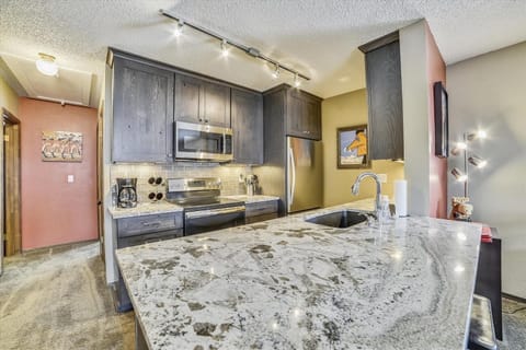 Condo, 2 Bedrooms | Private kitchen | Microwave, oven, coffee/tea maker, cookware/dishes/utensils