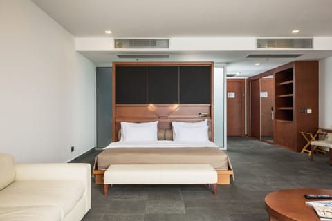 Luxury Suite, Balcony, Sea View | Premium bedding, minibar, in-room safe, desk