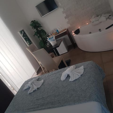 Premium bedding, desk, blackout drapes, soundproofing