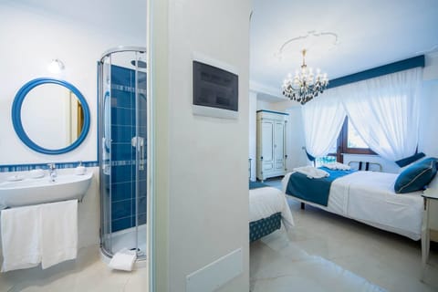 Superior Triple Room, Balcony, Sea View | 1 bedroom, premium bedding, minibar, in-room safe