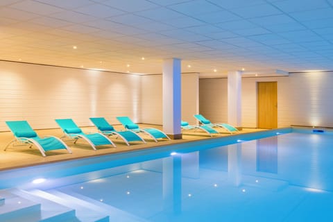 Indoor pool, open 6:30 AM to 10:00 PM, sun loungers