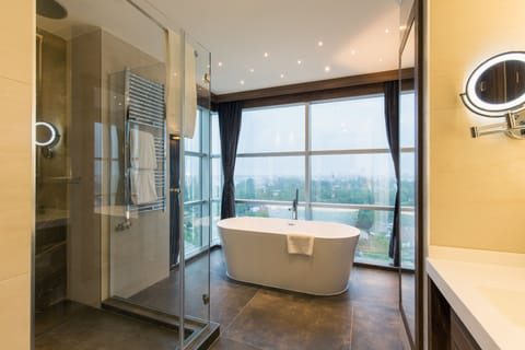 Designer toiletries, hair dryer, bathrobes, slippers