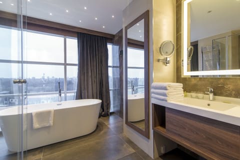 Designer toiletries, hair dryer, bathrobes, slippers