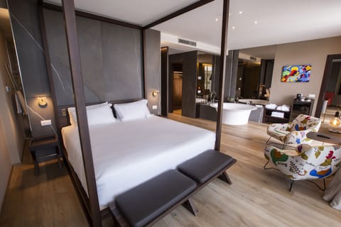 Premium bedding, down comforters, in-room safe, desk