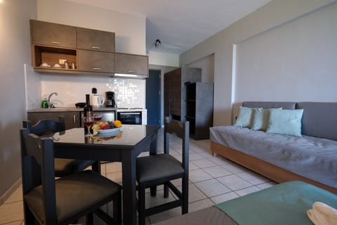 Fridge, stovetop, coffee/tea maker, electric kettle