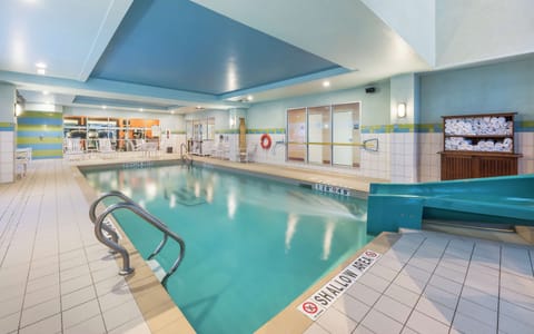 Indoor pool, open 7:00 AM to 10:00 PM, sun loungers