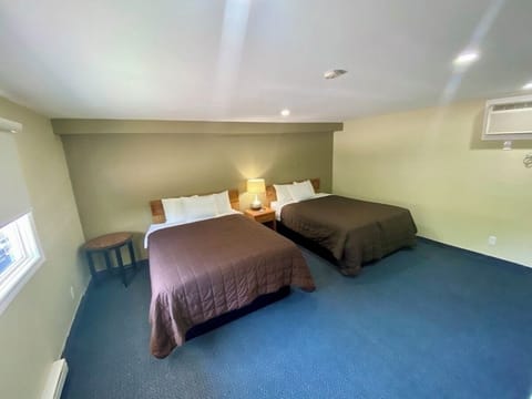 Deluxe Room, 2 Queen Beds, Non Smoking | WiFi (free), bed sheets