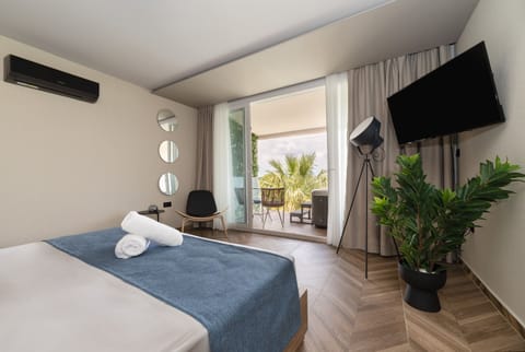 Mythic Blue Suite | Premium bedding, in-room safe, desk, laptop workspace