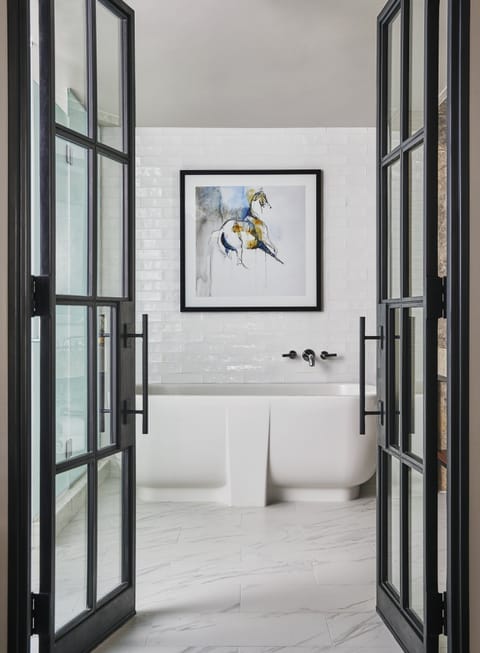 Suite, 1 Bedroom, Lake View | Bathroom | Combined shower/tub, designer toiletries, hair dryer, bathrobes