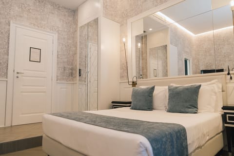 Suite, Balcony, City View | Premium bedding, down comforters, free minibar, in-room safe