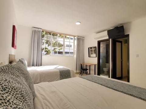 Double Room, 2 Double Beds | In-room safe, bed sheets