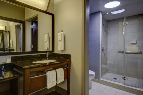 Combined shower/tub, designer toiletries, hair dryer, towels