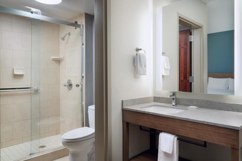 Combined shower/tub, designer toiletries, hair dryer, towels