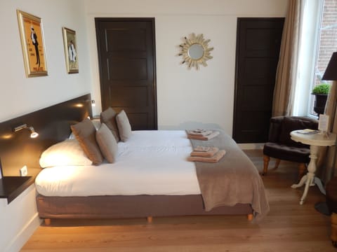 Blackout drapes, iron/ironing board, free WiFi, bed sheets