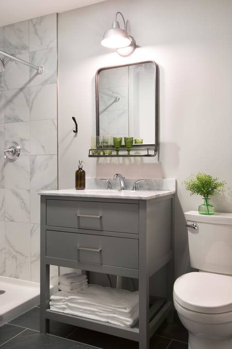 Designer toiletries, hair dryer, towels, soap