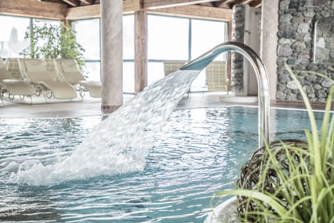 Indoor pool, outdoor pool, pool umbrellas, sun loungers