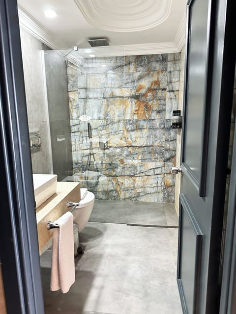 Hair dryer, slippers, towels