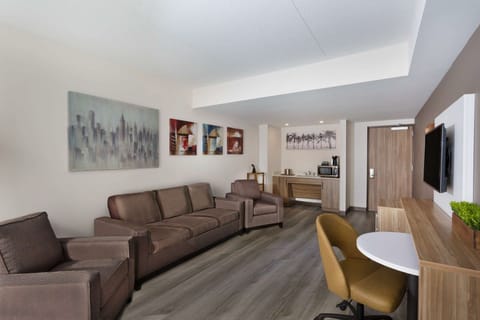 Premium bedding, down comforters, in-room safe, desk